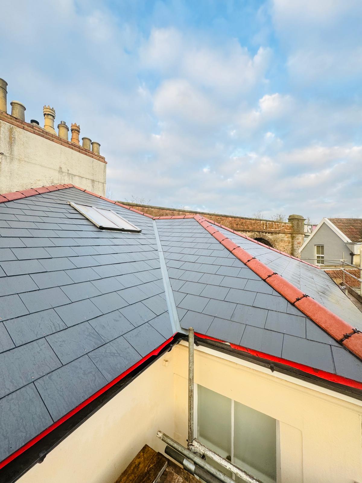 Roof felt replacement in progress