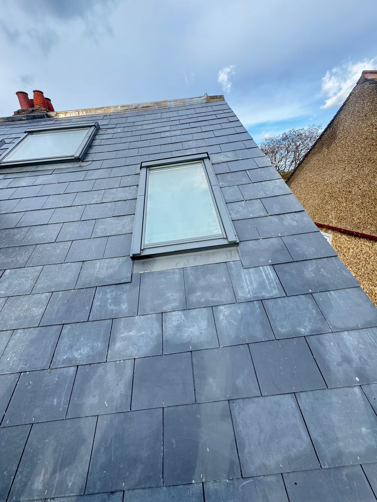 Slate roof with velux window